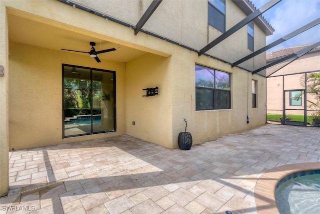 2738 Via Piazza Loop, Fort Myers, FL 33905 - view of patio with ceiling fan, glass enclosure, and an outdoor pool