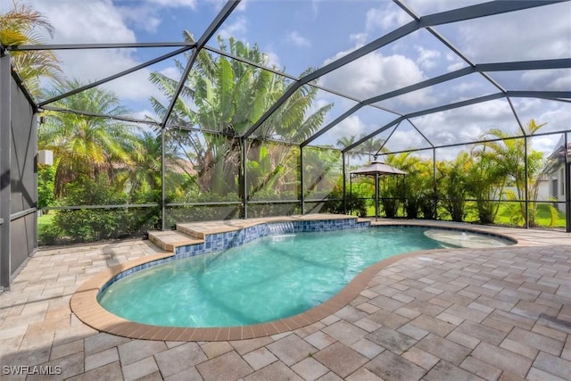 2738 Via Piazza Loop, Fort Myers, FL 33905 - swimming pool with a patio, a jacuzzi, and glass enclosure