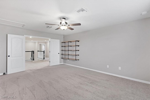 2738 Via Piazza Loop, Fort Myers, FL 33905 - carpeted empty room featuring ceiling fan and attic access