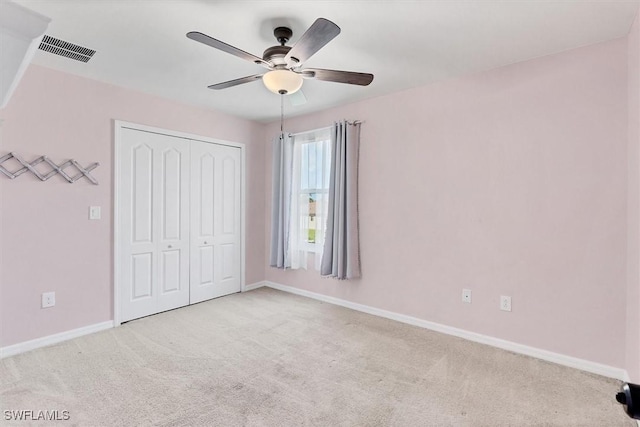 2738 Via Piazza Loop, Fort Myers, FL 33905 - unfurnished bedroom with carpet flooring, a closet, and ceiling fan