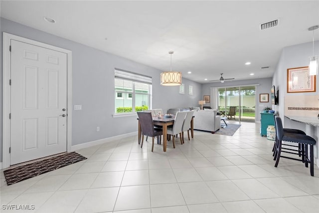 20147 Torch Key Way, Estero, FL 33928 - dining space featuring a ceiling fan, recessed lighting, and light tile patterned floors