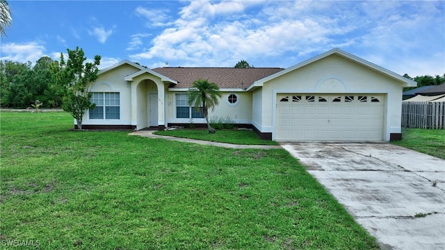 1612 Covington Meadows Cir, Lehigh Acres, FL 33936 - ranch-style house featuring concrete driveway, an attached garage, and stucco siding