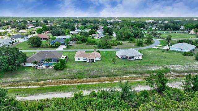 1612 Covington Meadows Cir, Lehigh Acres, FL 33936 - aerial perspective of suburban area