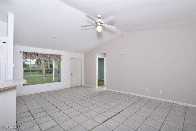 1612 Covington Meadows Cir, Lehigh Acres, FL 33936 - spare room with lofted ceiling, ceiling fan, and light tile patterned floors