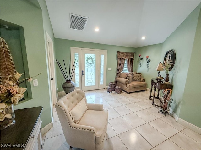 1700 E 15th St, Lehigh Acres, FL 33972 - living area with light tile patterned flooring and recessed lighting