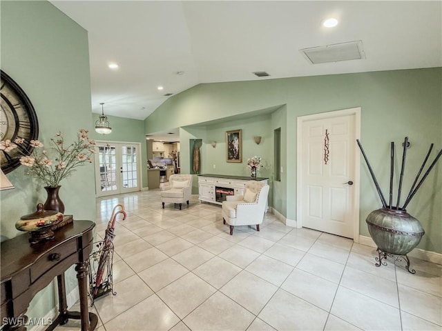 1700 E 15th St, Lehigh Acres, FL 33972 - entryway featuring vaulted ceiling, light tile patterned flooring, french doors, and recessed lighting