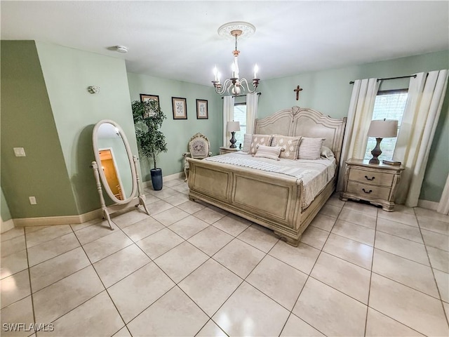 1700 E 15th St, Lehigh Acres, FL 33972 - bedroom with a chandelier and light tile patterned floors