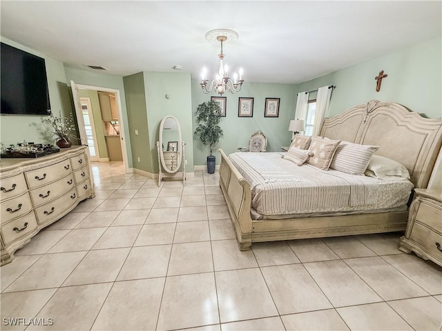 1700 E 15th St, Lehigh Acres, FL 33972 - bedroom featuring a chandelier and light tile patterned floors