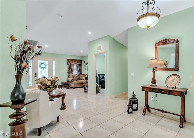 1700 E 15th St, Lehigh Acres, FL 33972 - hallway featuring light tile patterned floors and recessed lighting