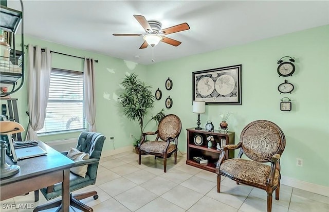 1700 E 15th St, Lehigh Acres, FL 33972 - home office with a ceiling fan and light tile patterned flooring