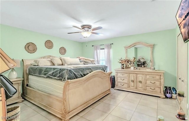 1700 E 15th St, Lehigh Acres, FL 33972 - bedroom with light tile patterned flooring and ceiling fan