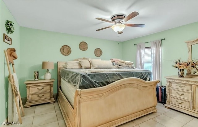1700 E 15th St, Lehigh Acres, FL 33972 - bedroom featuring light tile patterned floors and a ceiling fan