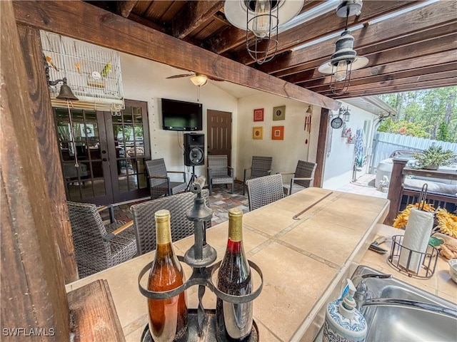 1700 E 15th St, Lehigh Acres, FL 33972 - view of patio / terrace with french doors and a ceiling fan