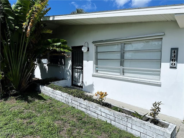 4360 Deleon St, Fort Myers, FL 33901 - entrance to property with stucco siding