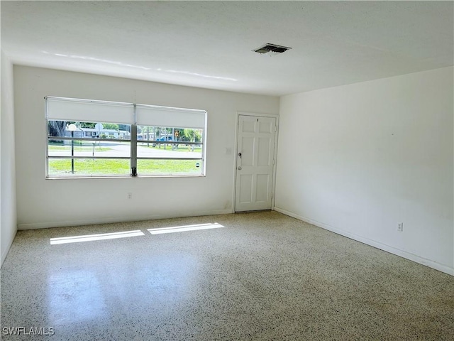 4360 Deleon St, Fort Myers, FL 33901 - unfurnished room with plenty of natural light and speckled floor