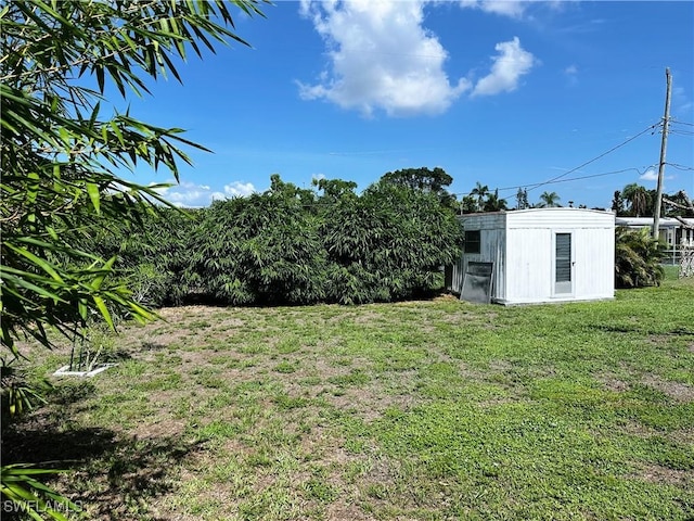 4360 Deleon St, Fort Myers, FL 33901 - view of grassy yard with a storage shed