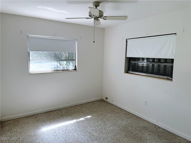 4360 Deleon St, Fort Myers, FL 33901 - empty room with ceiling fan and speckled floor