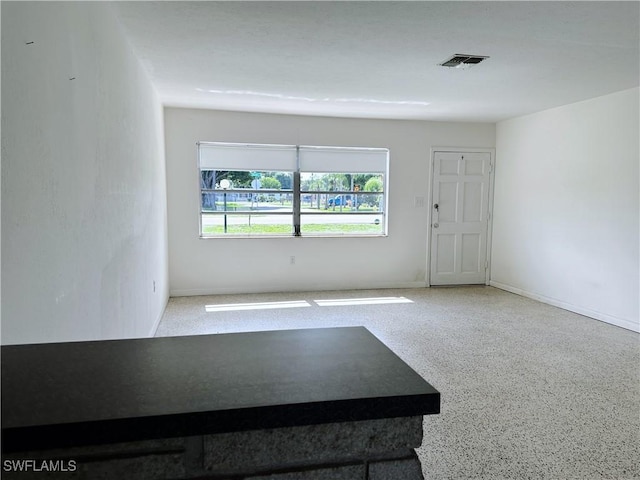 4360 Deleon St, Fort Myers, FL 33901 - spare room featuring speckle patterned floor