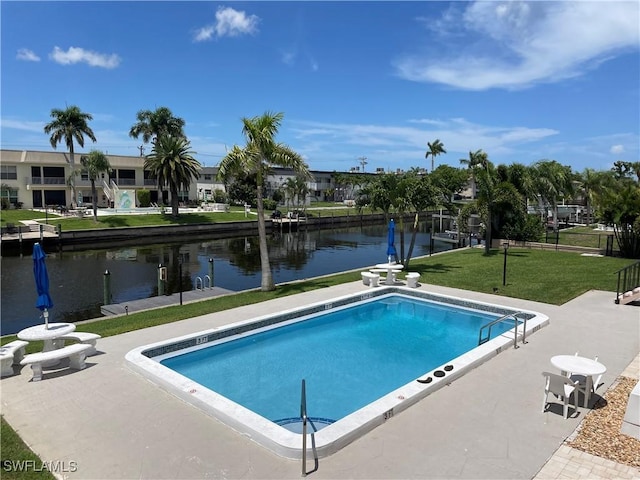 834 SE 46th St Unit 2A, Cape Coral, FL 33904 - view of pool with a water view and a yard