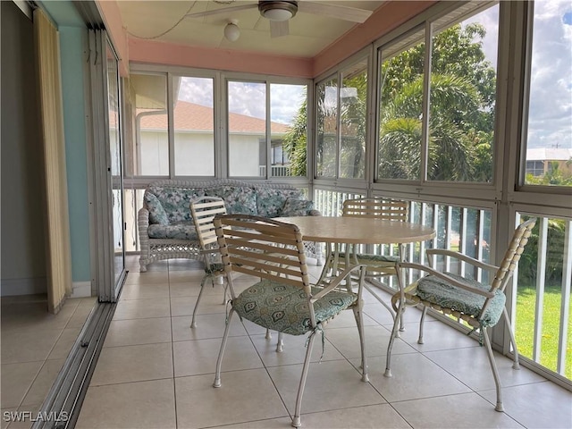 834 SE 46th St Unit 2A, Cape Coral, FL 33904 - sunroom with a ceiling fan and outdoor dining space