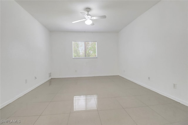 765 Aprile Ave S, Lehigh Acres, FL 33974 - unfurnished room featuring a ceiling fan and light tile patterned flooring