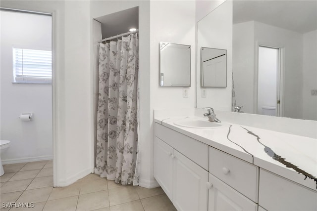 765 Aprile Ave S, Lehigh Acres, FL 33974 - full bath with vanity, tile patterned floors, and a shower with curtain
