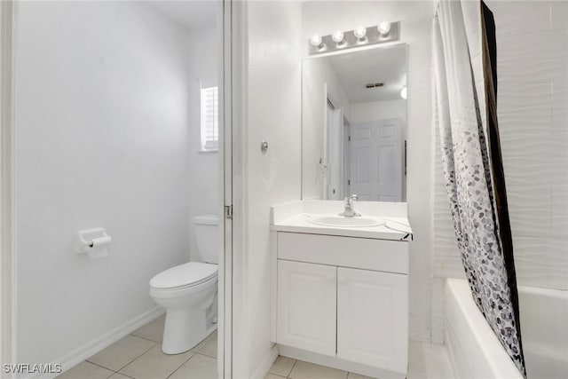 765 Aprile Ave S, Lehigh Acres, FL 33974 - full bathroom with vanity, tile patterned floors, and shower / bath combo with shower curtain