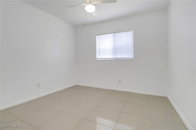 765 Aprile Ave S, Lehigh Acres, FL 33974 - spare room with a ceiling fan and light tile patterned floors