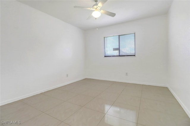 765 Aprile Ave S, Lehigh Acres, FL 33974 - unfurnished room featuring light tile patterned flooring and a ceiling fan