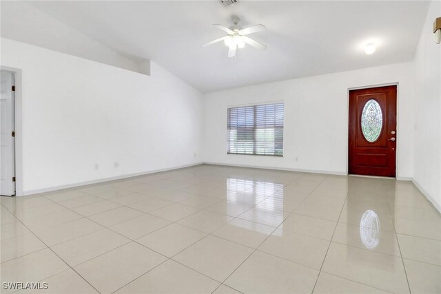 765 Aprile Ave S, Lehigh Acres, FL 33974 - entryway featuring lofted ceiling, ceiling fan, and light tile patterned floors