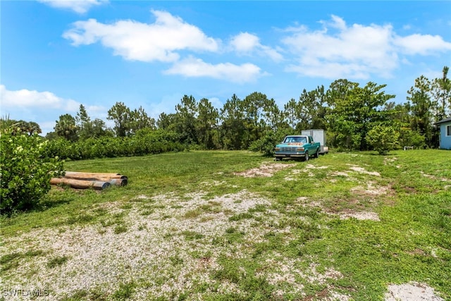 765 Aprile Ave S, Lehigh Acres, FL 33974 - view of grassy yard