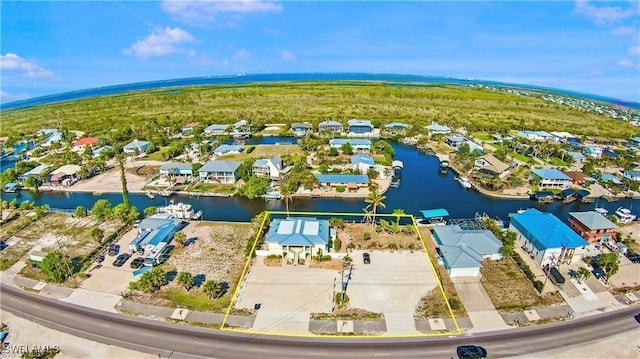 3226 Stringfellow Rd, Saint James City, FL 33956 - aerial view of residential area featuring a nearby body of water
