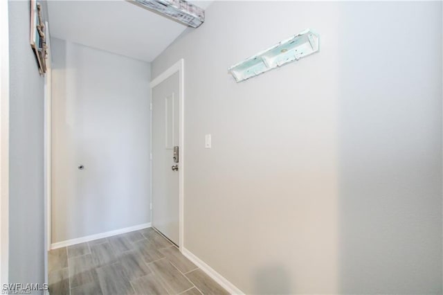 3226 Stringfellow Rd, Saint James City, FL 33956 - hall with wood finish floors and baseboards