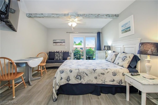 3226 Stringfellow Rd, Saint James City, FL 33956 - bedroom with wood tiled floors, a ceiling fan, and access to outside