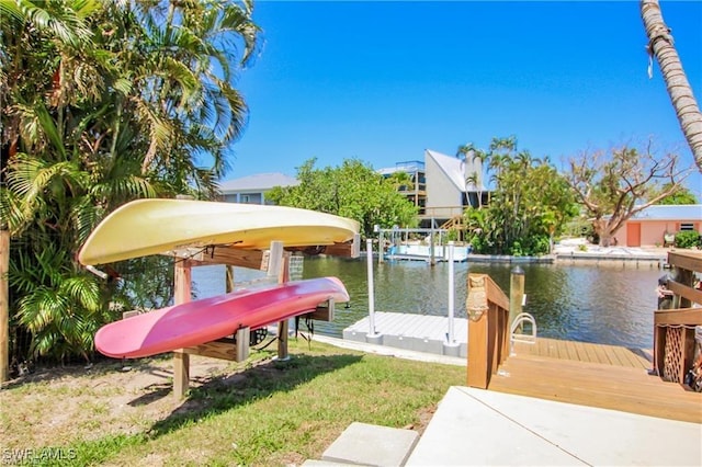 3226 Stringfellow Rd, Saint James City, FL 33956 - dock featuring a water view and boat lift