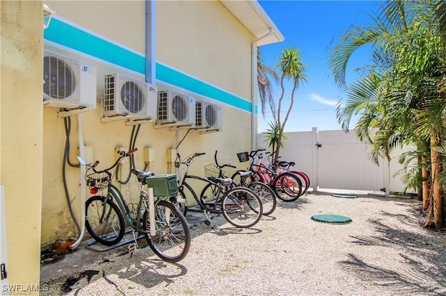 3226 Stringfellow Rd, Saint James City, FL 33956 - view of property exterior with stucco siding and an ac unit