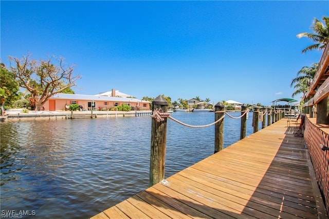 3226 Stringfellow Rd, Saint James City, FL 33956 - dock with a water view