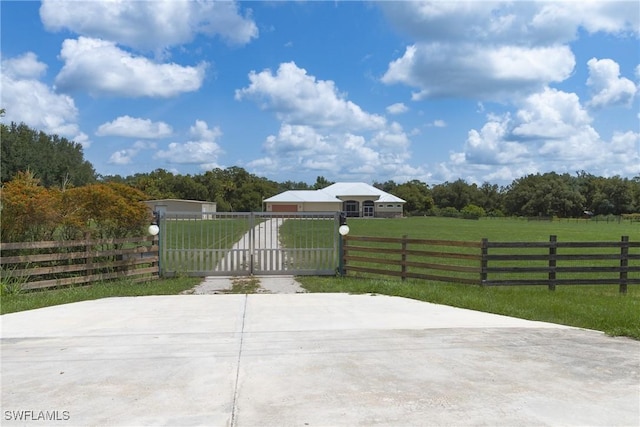 19801 N River Rd, Alva, FL 33920 - view of patio featuring a fenced front yard and a gate