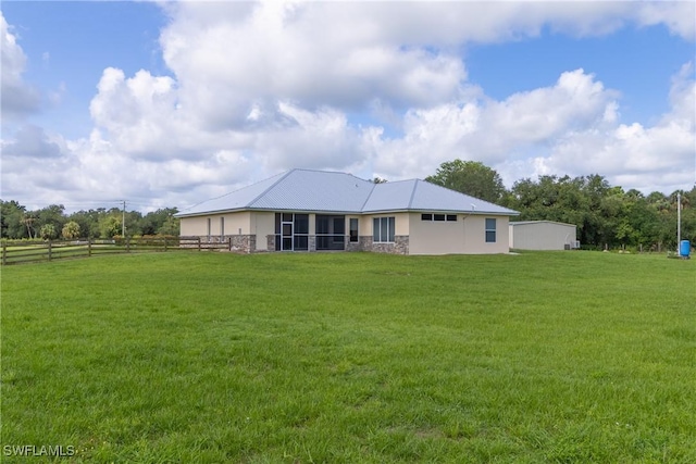 19801 N River Rd, Alva, FL 33920 - rear view of property with stone siding and a sunroom