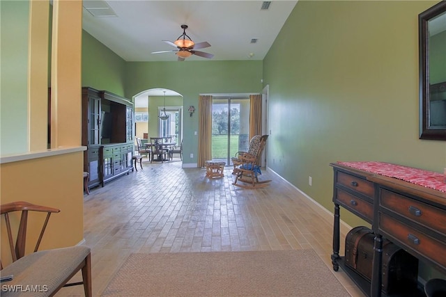 19801 N River Rd, Alva, FL 33920 - sitting room with ceiling fan and arched walkways