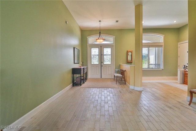 19801 N River Rd, Alva, FL 33920 - entryway featuring healthy amount of natural light, wood finished floors, and recessed lighting