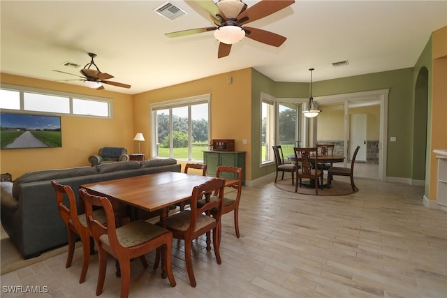 19801 N River Rd, Alva, FL 33920 - dining area featuring ceiling fan and arched walkways