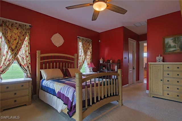 19801 N River Rd, Alva, FL 33920 - bedroom with carpet flooring and ceiling fan