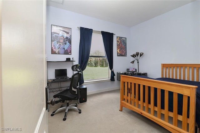 19801 N River Rd, Alva, FL 33920 - carpeted bedroom with an office area and baseboards