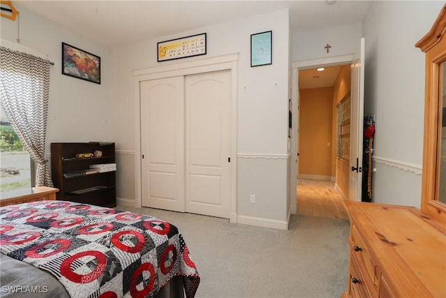 19801 N River Rd, Alva, FL 33920 - bedroom with light carpet and a closet