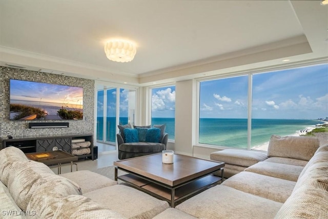 10 Seagate Dr Unit 10N, Naples, FL 34103 - living room featuring a water view and a raised ceiling