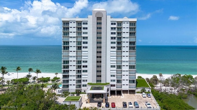 10 Seagate Dr Unit 10N, Naples, FL 34103 - view of apartment building / complex featuring view of water and beach