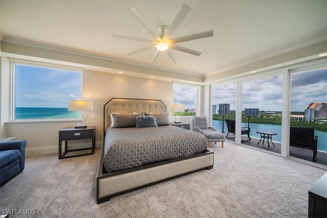 10 Seagate Dr Unit 10N, Naples, FL 34103 - bedroom featuring access to exterior, ornamental molding, carpet flooring, and multiple windows