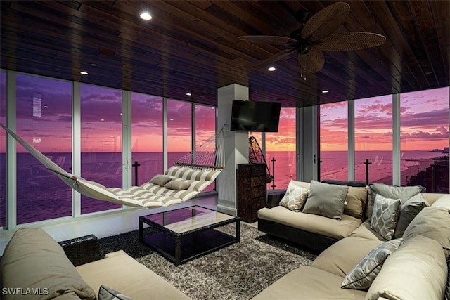 10 Seagate Dr Unit 10N, Naples, FL 34103 - living area with wood ceiling and ceiling fan