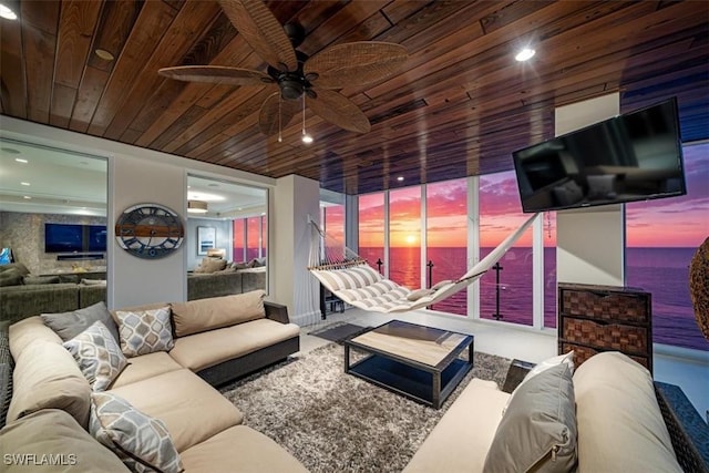 10 Seagate Dr Unit 10N, Naples, FL 34103 - living room with wood ceiling, ceiling fan, and recessed lighting
